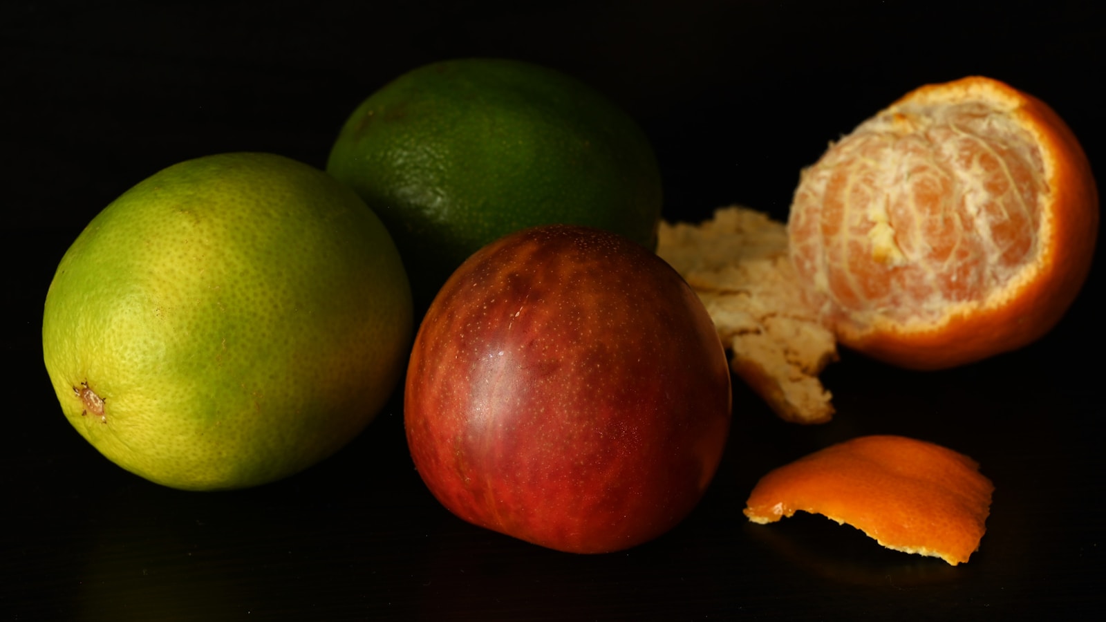 A group of fruit sitting on top of a table